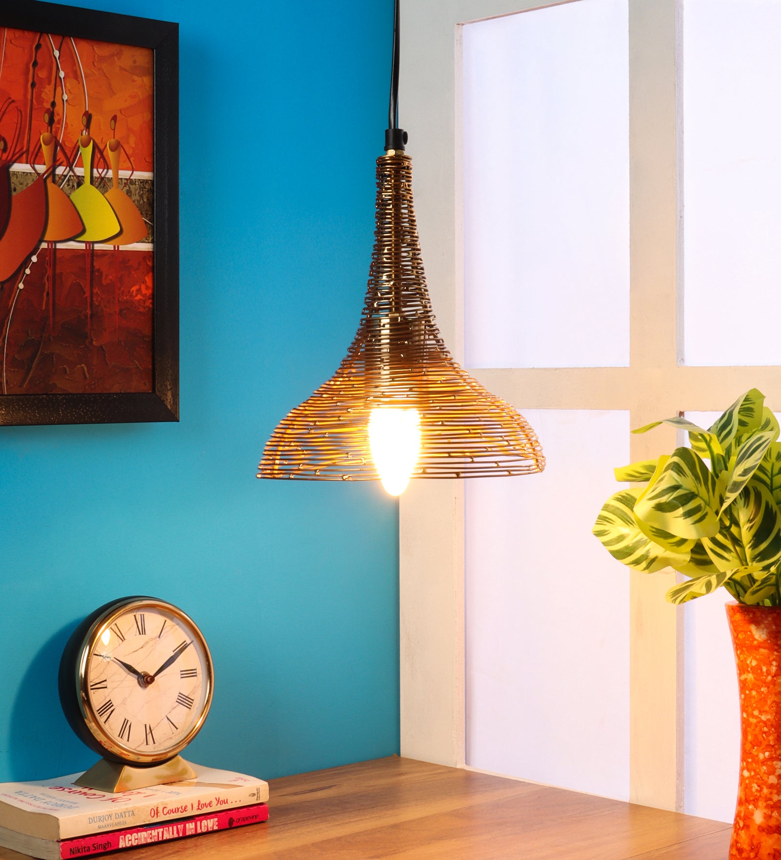 The Shimmering Funnel Pendant light in Gold finish