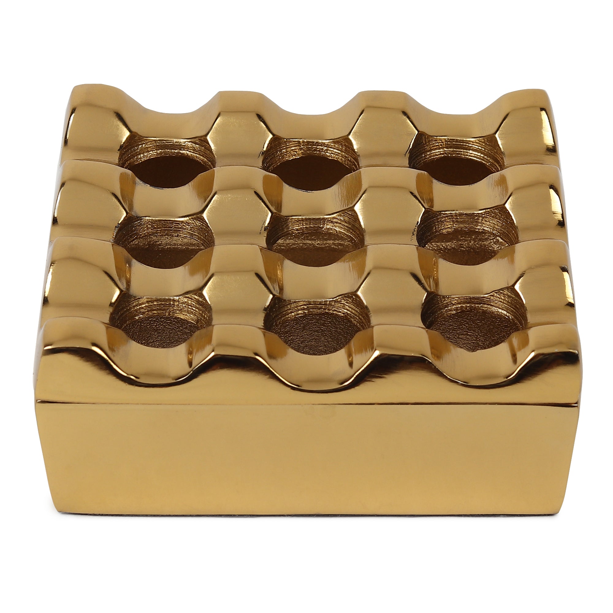 Alaric’s ashtray in gold