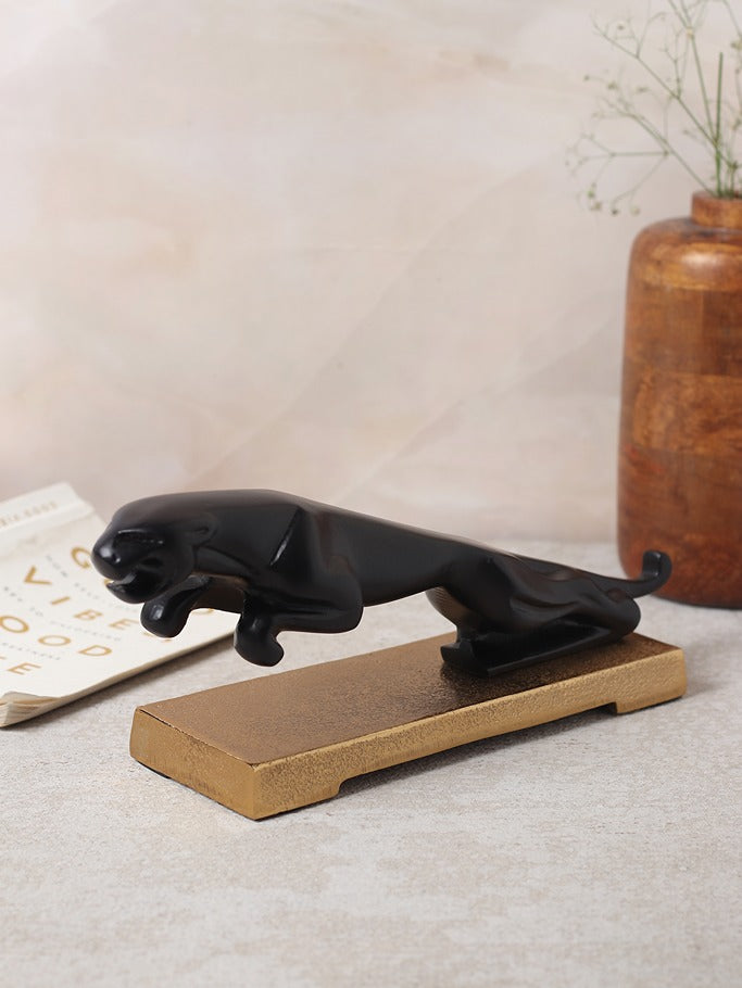 The panther's leap on gold base